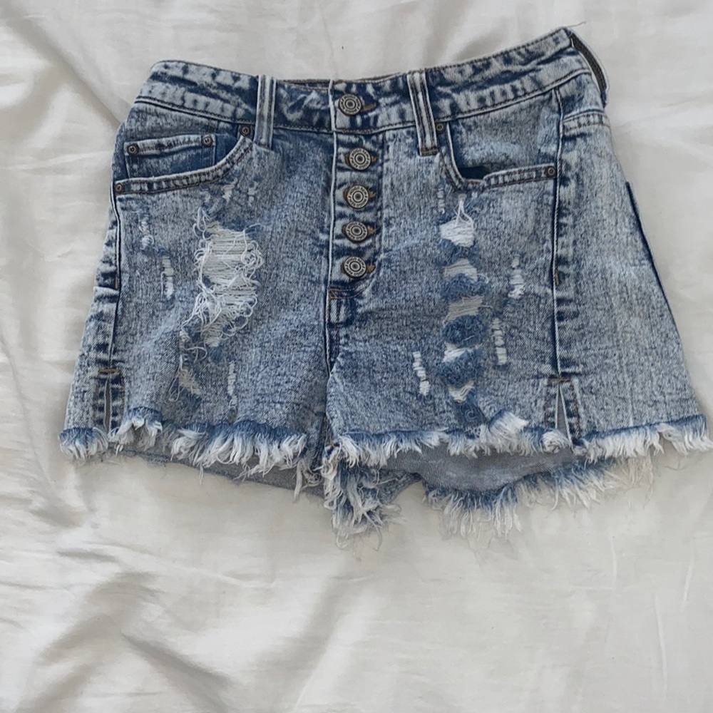 blue/bleached ripped jean shorts.